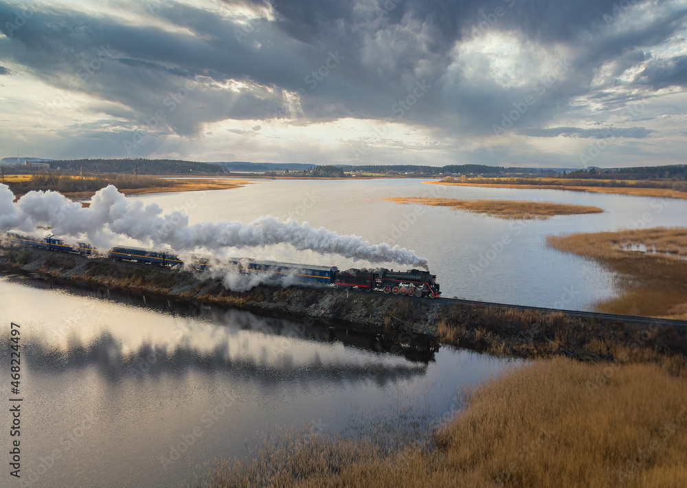 retro steam locomotive goes to Ruskeala park. Karelia. Russia. november 2021