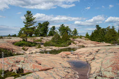 smooth red granite rocks on the Canadian Shield photo