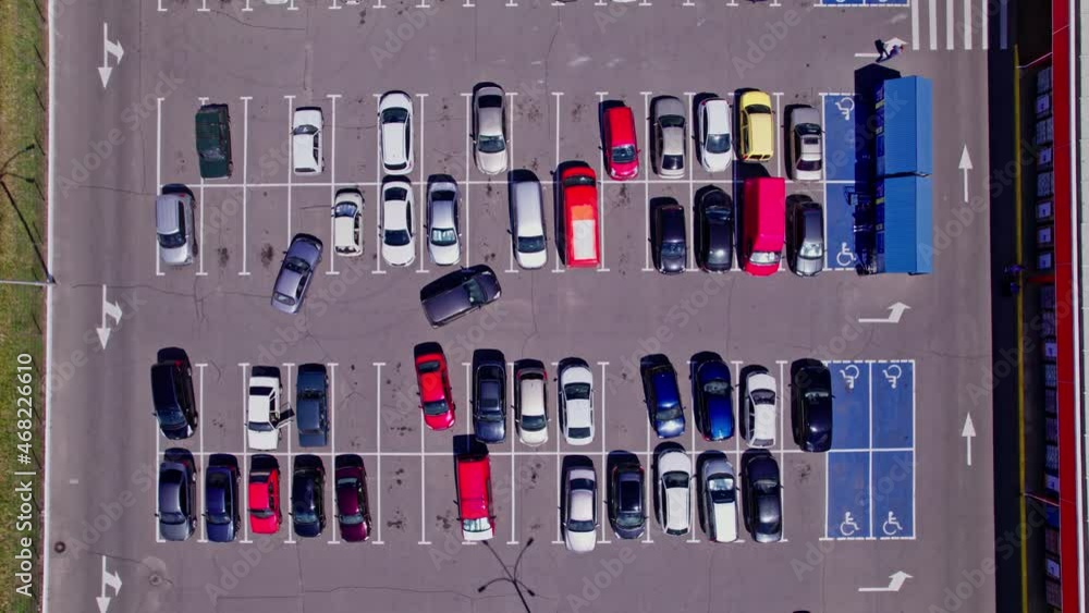 Aerial top view from drone of parking lot cars of the business center Aerial top view from drone of parking lot cars of the business center