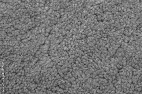 Texture of a soft gray carpet. Background.