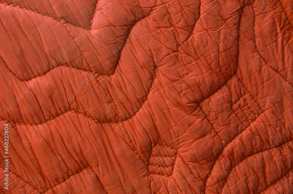 red large bedspread. orange unusual texture. magenta rippled background. purple embossed surface red large bedspread. orange unusual texture. magenta rippled background. purple embossed surface