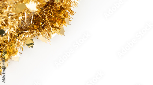 Christmas decoration isolated on white background. Golden tinsel Xmas ornaments