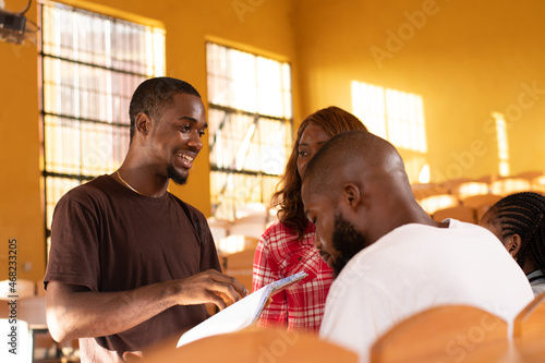 black students discussing their studies in a group