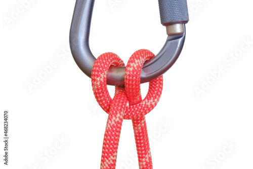 Obraz na płótnie Clove hitch tied with red rope on carabiner, isolated on white background. This clove hitch knot used in climbing is called Mastwurf in German and Noeud de cabestan in French. w salonie