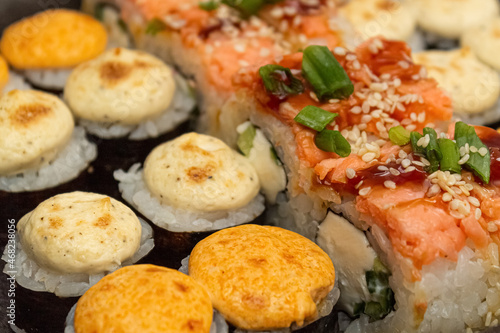 Japanese dish of sushi or rolls close-up.