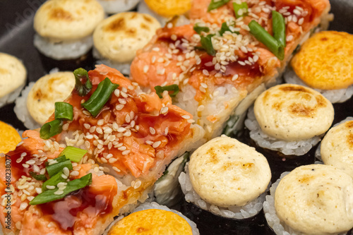 Japanese dish of sushi or rolls close-up.