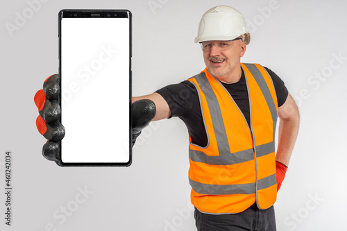 Phone hand close up. Builde...