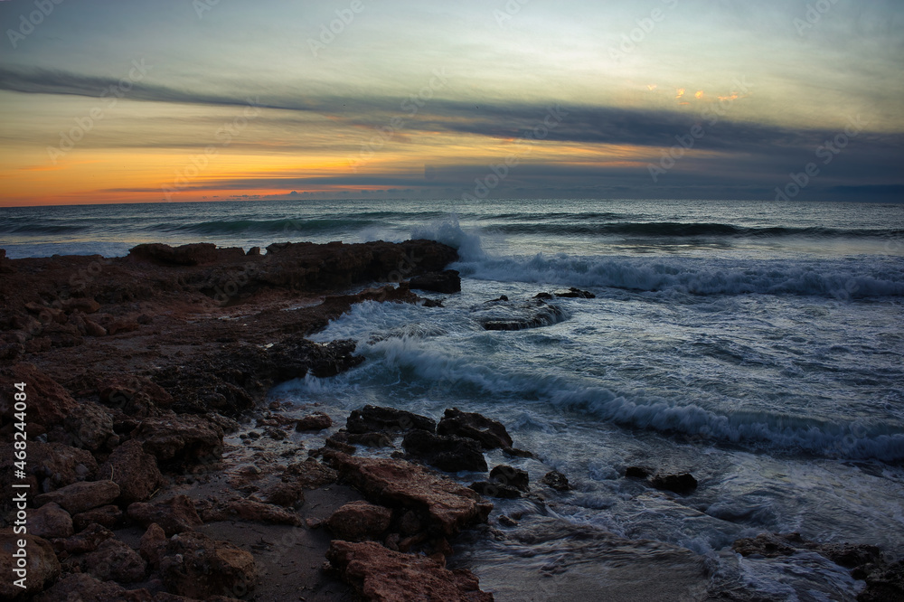 Sunrise with the rough sea on the Costa Azahar