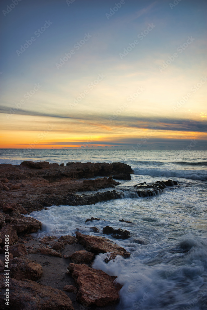 Sunrise with the rough sea on the Costa Azahar