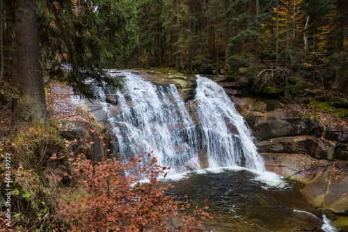 Fototapeta Naklejka Na Ścianę i Meble -  small waterfall on a river in czech mountains