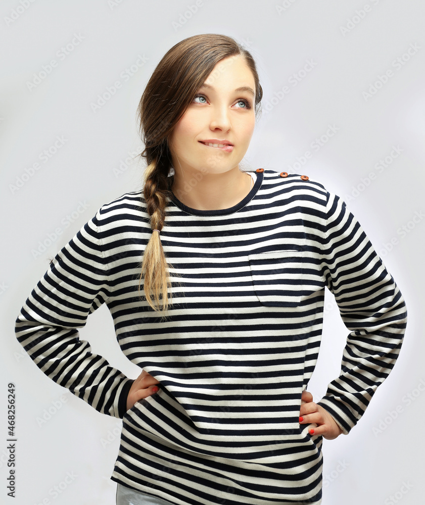 Doubt.Young woman thinking. dreaming girl