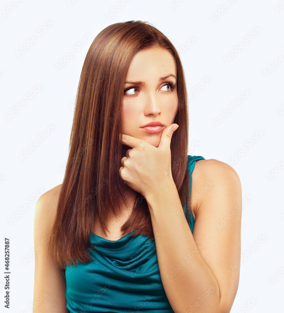 Portrait of displeased young girl . Portrait of worried woman Portrait of displeased young girl . Portrait of worried woman