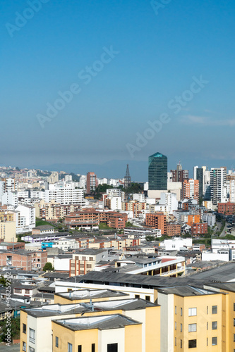 Panoramic and urban landscape of the city of Manizales and blue sky. Manizales, Caldas, Colombia.