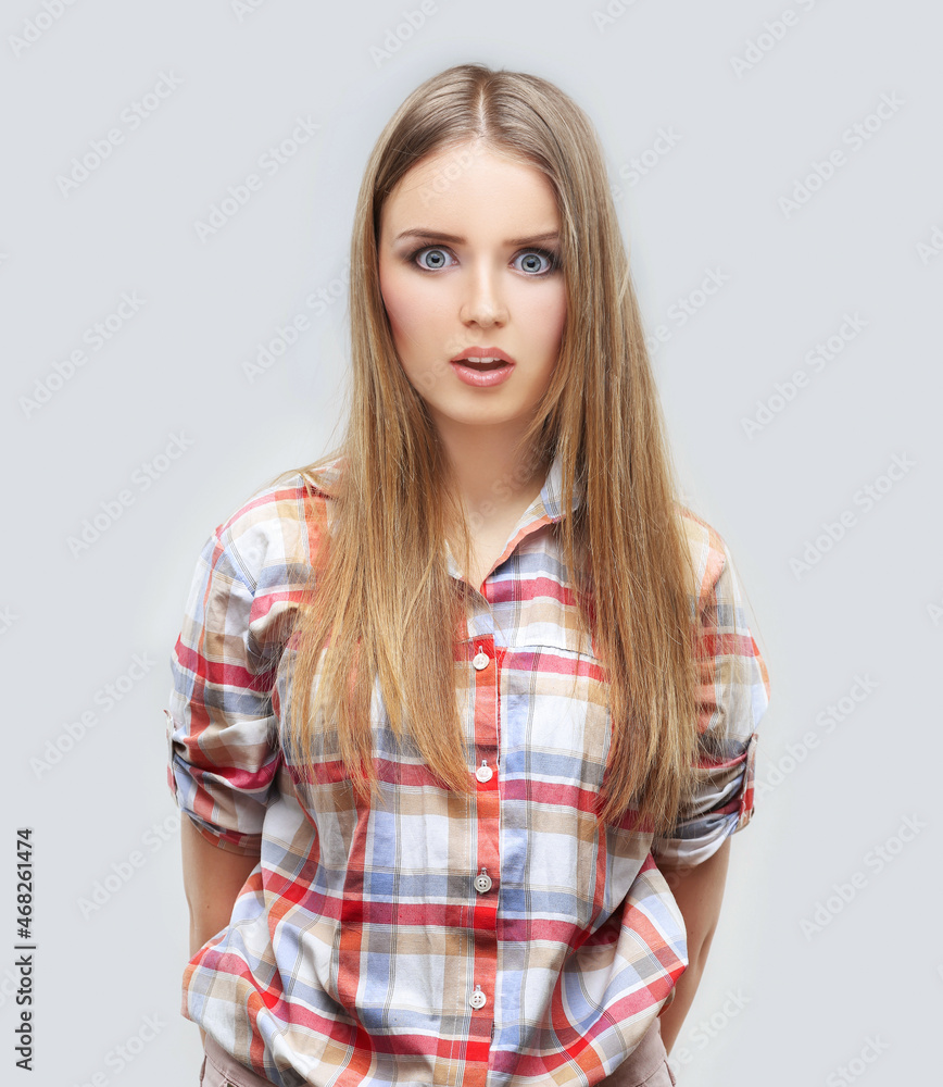 frightened and surprised girl. young woman shocked frightened and surprised girl. young woman shocked