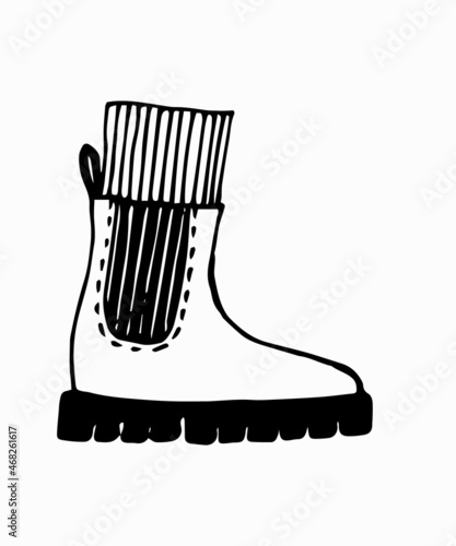 Warm winter shoes. Trending chelsea for cold weather. Vector hand drawn contour illustration.