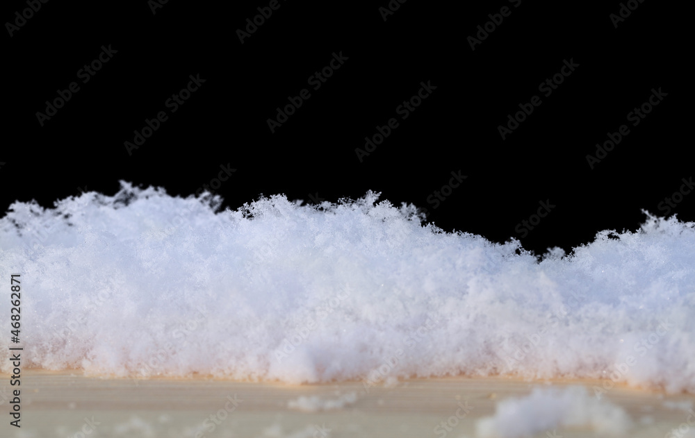 white snow in daylight, background, isolate on black background