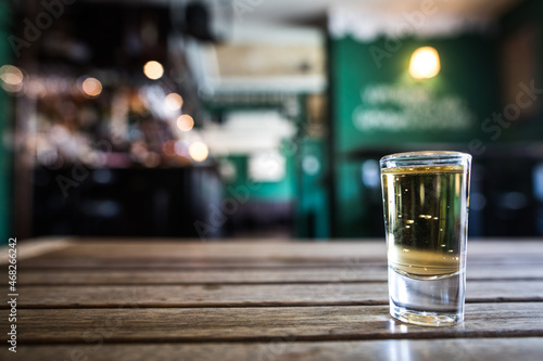 Shot glass on a bar counter