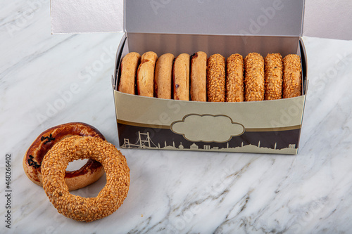 Turkish Bagel Kandil simidi with box. (stack of pastry). Turkish Pastry Salted Ring Cookies Oil Lamp. photo