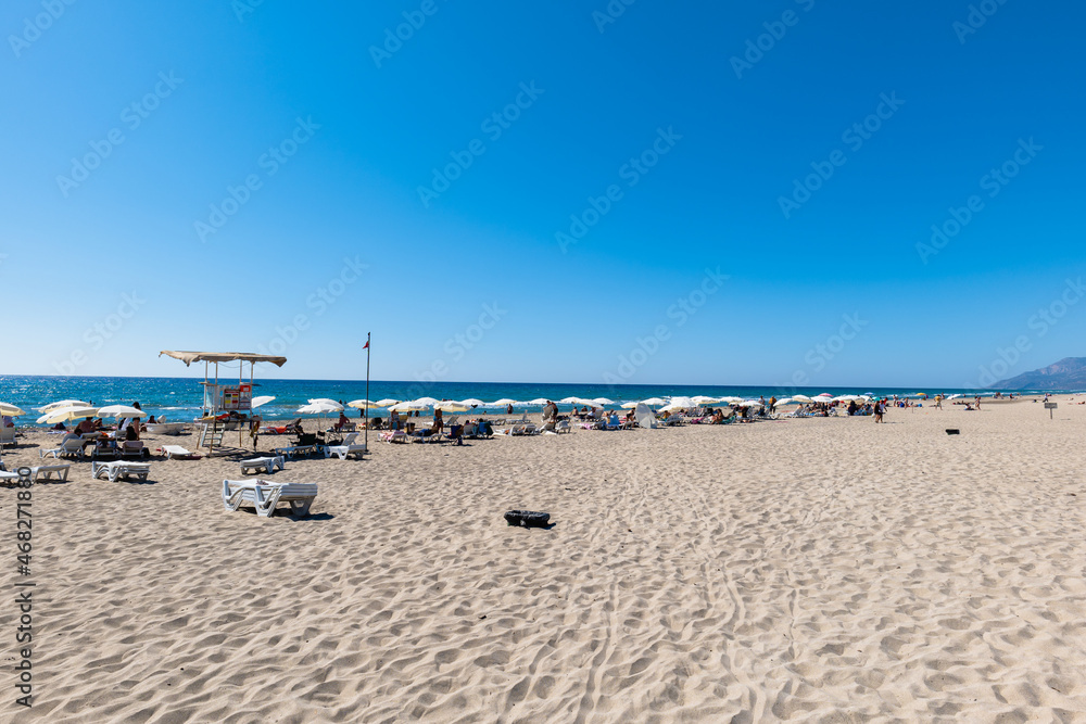 Patara beach in Patara, Turkey. A popular resort beach on the Mediterranean coast with sand dunes in Turkey. 