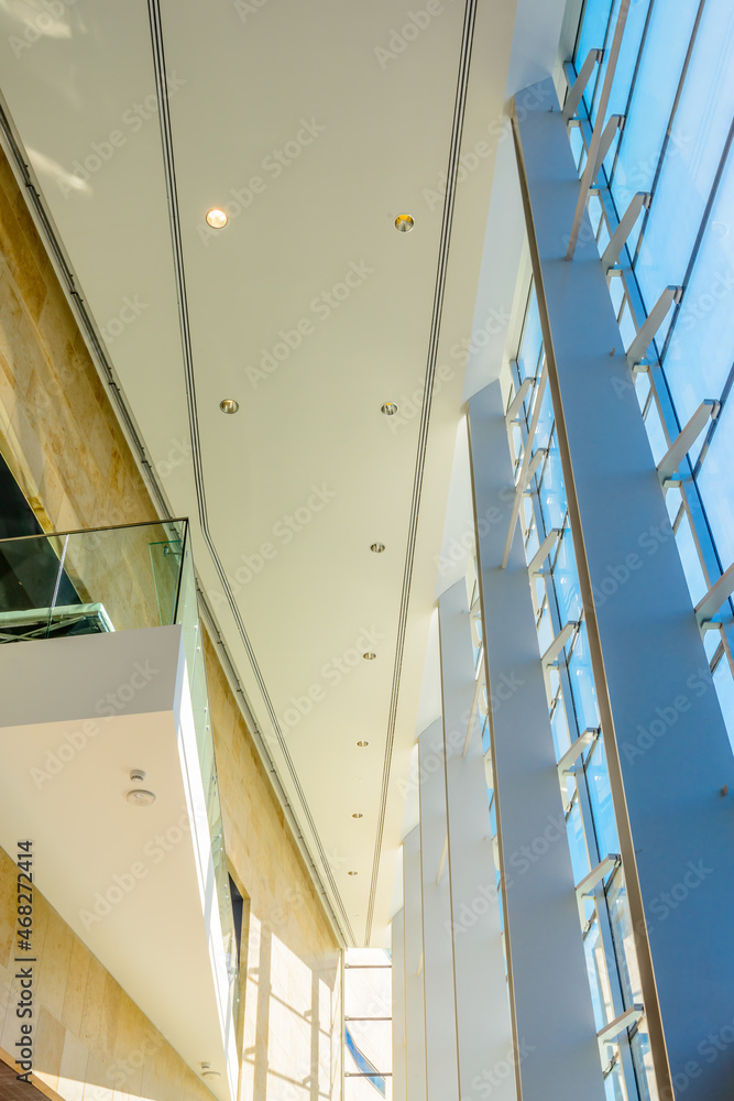 Obraz premium Painted in brown. Abstract fragment of the architecture of modern lobby, hallway of the luxury hotel, shopping mall, business center in Vancouver, Canada. Interior design.