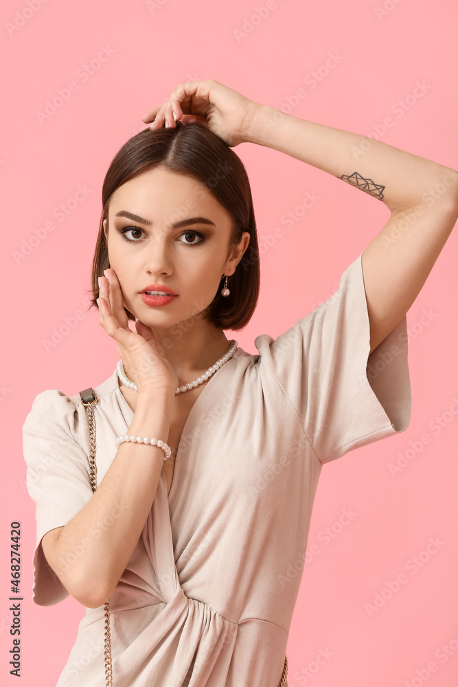 Portrait of fashionable woman with stylish accessories on color background Portrait of fashionable woman with stylish accessories on color background