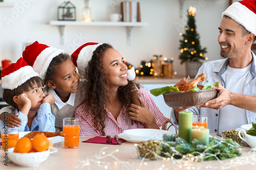 Happy family having Christm...