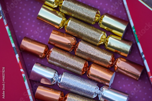 A group of sparkly Christmas crackers.