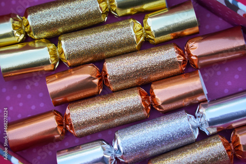 A group of sparkly Christmas crackers.