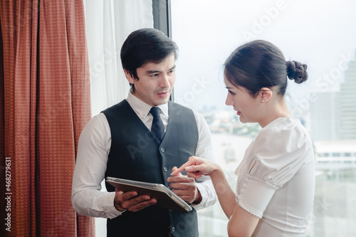 business partner meeting concept, businessman and woman talking together in work office