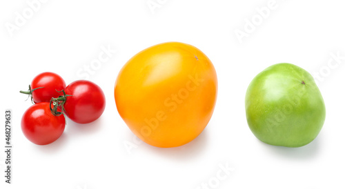 Different fresh tomatoes isolated on white background