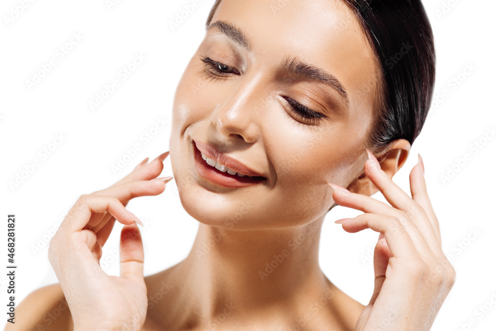 Beautiful woman with clean fresh skin on a white isolated background, woman with perfect skin and bare shoulders Beautiful woman with clean fresh skin on a white isolated background, woman with perfect skin and bare shoulders