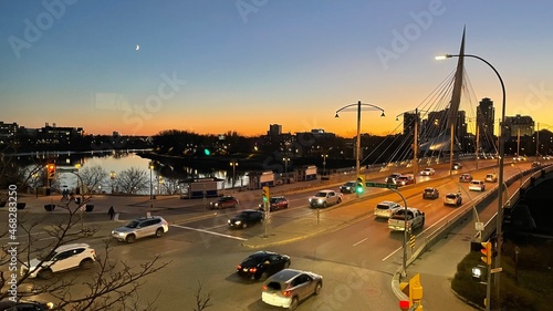 Esplanade Riel Footbridge - Winnipeg MB, sunset with a crescent moon during the Fall Season