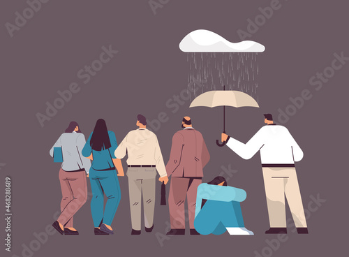 man holding an umbrella to protect sad woman from rain mental health diseases unemployment depression stress