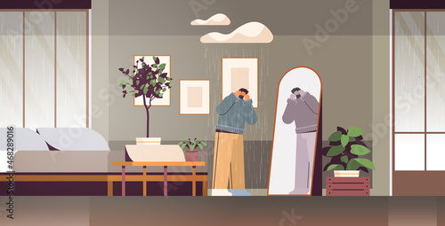 unhappy depressed man looking at mirror guy feeling desperate mental health diseases depression stress concept