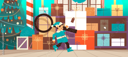 elf holding magnifying glass santa helper preparing for new year and christmas holidays celebration full length