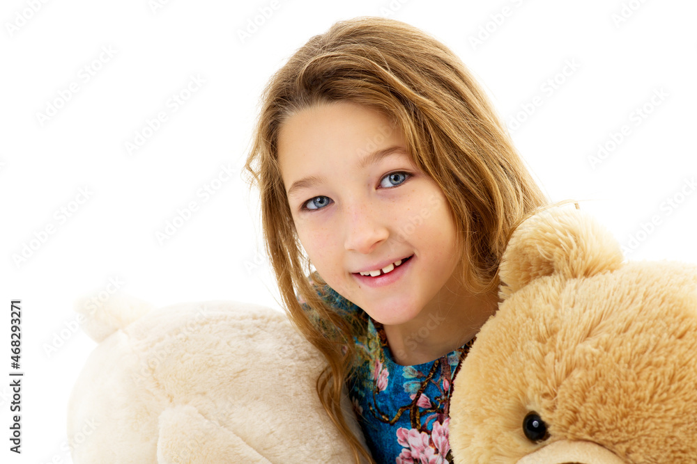 Little girl with teddy bear.Isolated on white background. Little girl with teddy bear.Isolated on white background.