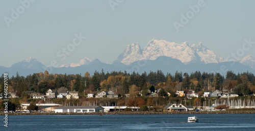 Houses near Squalicum Beach in Bellingham with Canadian Border Peaks in the background photo