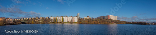 Apartment houses at the waterfront of the Stockholm islands Lilla Essingen and Kungsholmen a sunny and color full autumn day in Stockholm