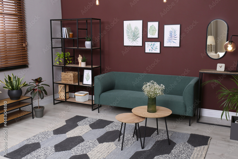 Fototapeta premium Beautiful living room interior with comfortable sofa