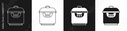 Set Slow cooker icon isolated on black and white background. Electric pan. Vector
