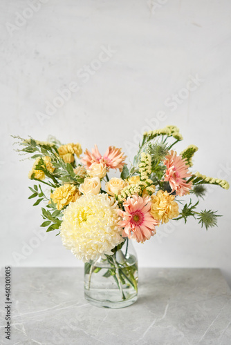 Finished flower arrangement in a vase for home. Flowers bunch, set for interior. Fresh cut flowers for decoration home. European floral shop. Delivery fresh cut flower. © malkovkosta