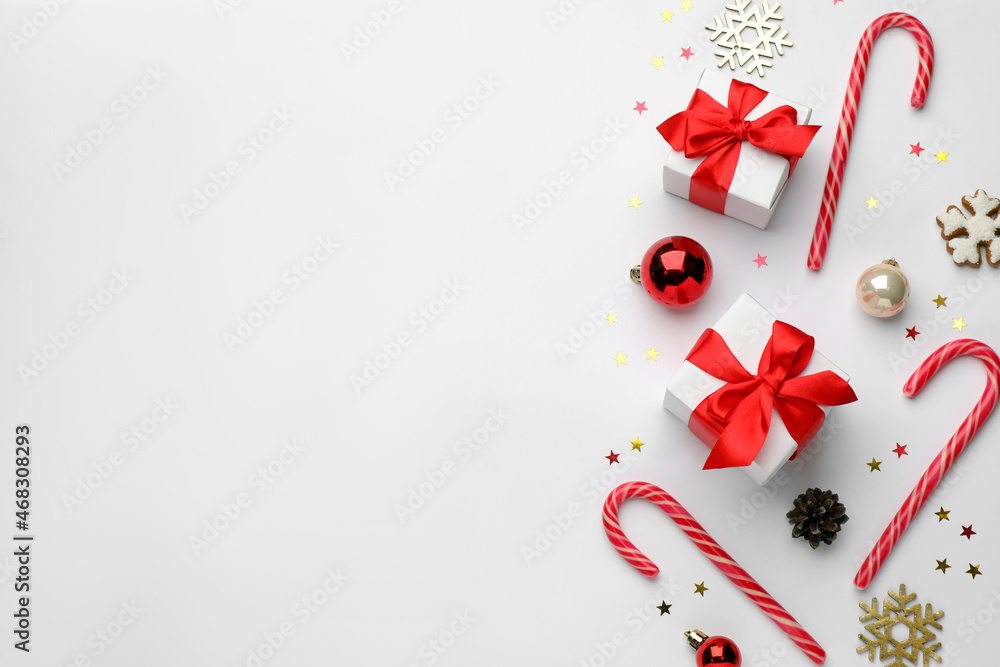 Flat lay composition with sweet candy canes and Christmas decor, space for text Flat lay composition with sweet candy canes and Christmas decor, space for text