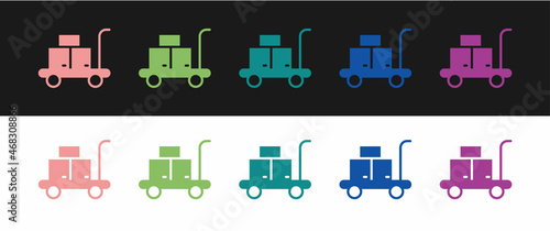 Set Trolley suitcase icon isolated on black and white background. Traveling baggage sign. Travel luggage icon. Vector