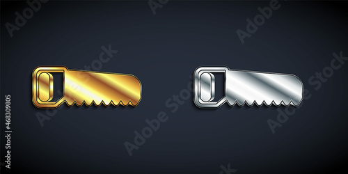Gold and silver Hand saw icon isolated on black background. Long shadow style. Vector