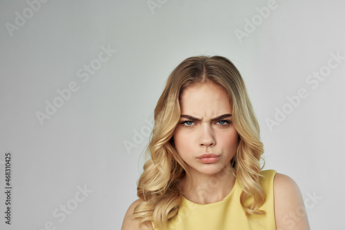 blonde in a yellow dress fun isolated background