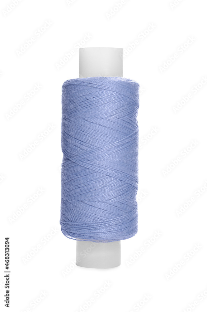 Spool of light steel blue sewing thread isolated on white Spool of light steel blue sewing thread isolated on white