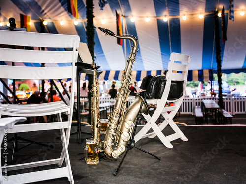 Saxophones on stage ready to perform in a live October Fest concert.