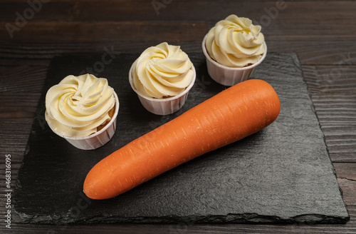 homemade carrot muffins with walnuts and cinnamon - on a stone base. Men's health.