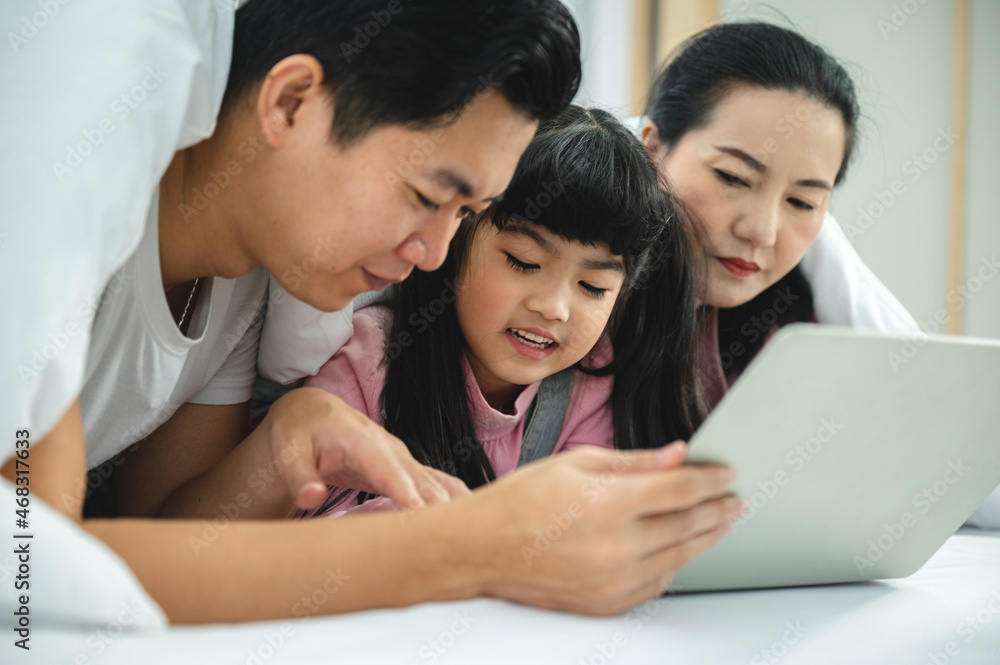 education at home, young mother and child family learning to work a homework with laptop education at home, young mother and child family learning to work a homework with laptop