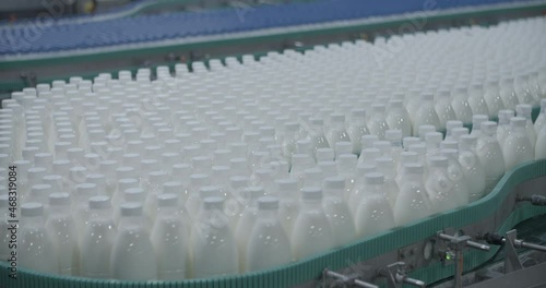 Conveyor with milk bottles